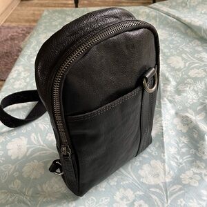 Spikes and Sparrow black leather sling bag